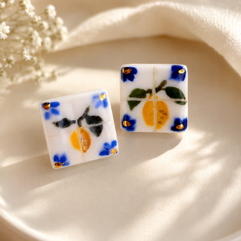 Pair of hand-painted porcelain lemon tile stud earrings with blue florals and 22K gold lustre corner accents – BitaJewells