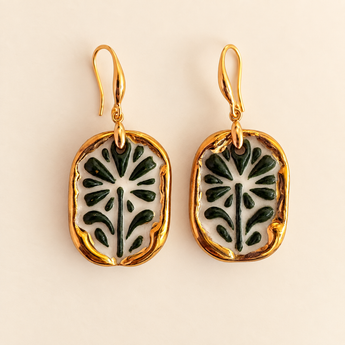 Pair of green botanical relief porcelain drop earrings with gold edges and hooks