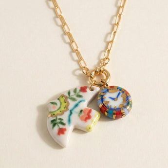 Time Flies porcelain dove and clock charm necklace with 22K gold lustre