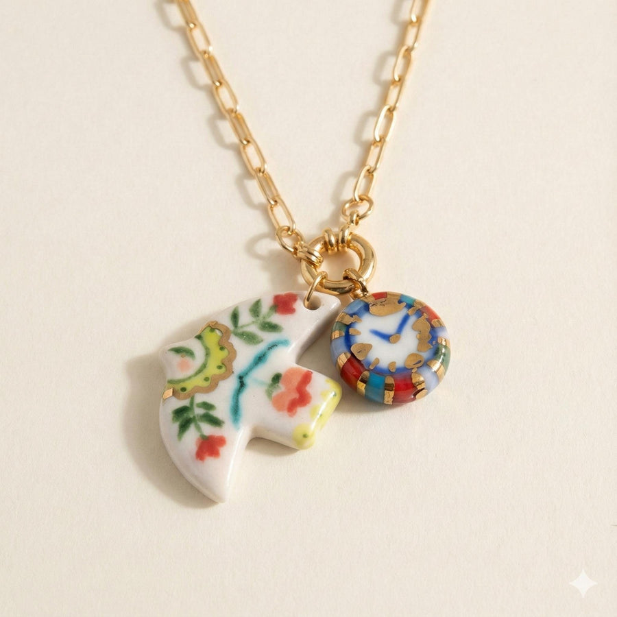 Time Flies porcelain dove and clock charm necklace with 22K gold lustre