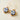 Gold Flower Face Earrings - image 1