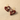 Burgundy cotton flower heart earrings worn, lifestyle photo showing scale