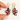 Hand holding burgundy floral porcelain dove earrings