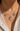 Moon eye skull charm necklace close-up on evil eye porcelain charm with 22K gold lustre