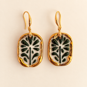Pair of green botanical relief porcelain drop earrings with gold edges and hooks