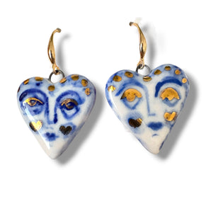 BitaJewells Handmade Porcelain Face Design Shape earrings featuring a unique heart design adorned with blue and gold details. A stunning example of Porcelain Earrings with unique face design.
