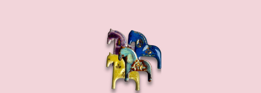 colorful handmade ceramic horse brooches with a real gold decoration