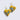 Heart-shaped earrings with a floral design on a yellow background