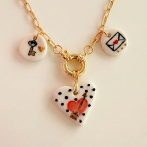 Cupid arrow porcelain heart necklace with key and love-letter charms
